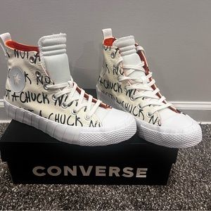 Kids “Not A Chuck” high top Converse. Kids/boys size 6, Woman’s size 8.